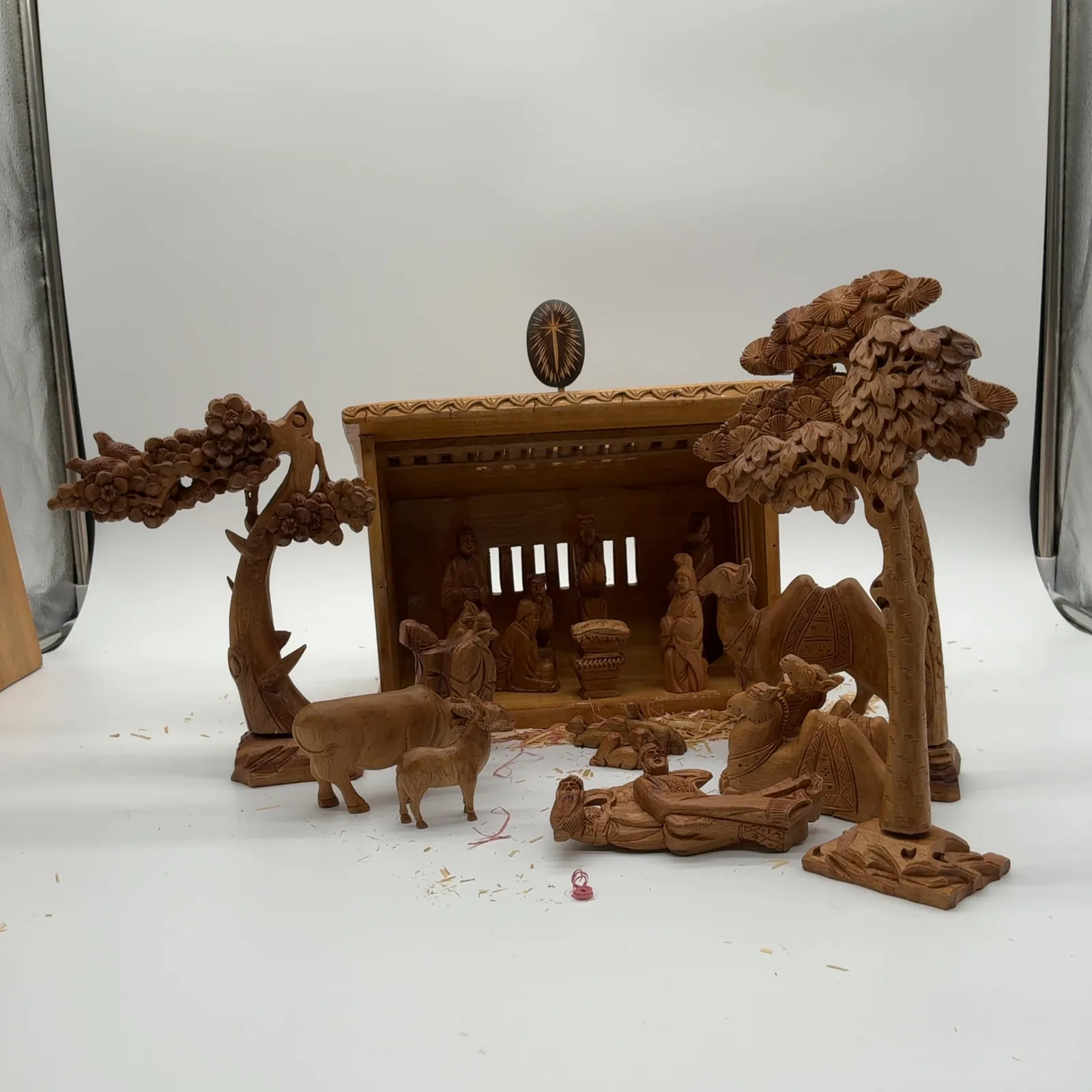 Carved Wood Nativity Scene with Figures and Animals