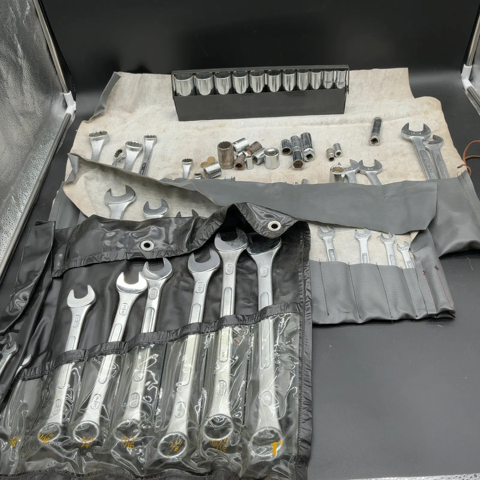 Assorted Wrenches Sockets Tool Rolls and Socket Rack
