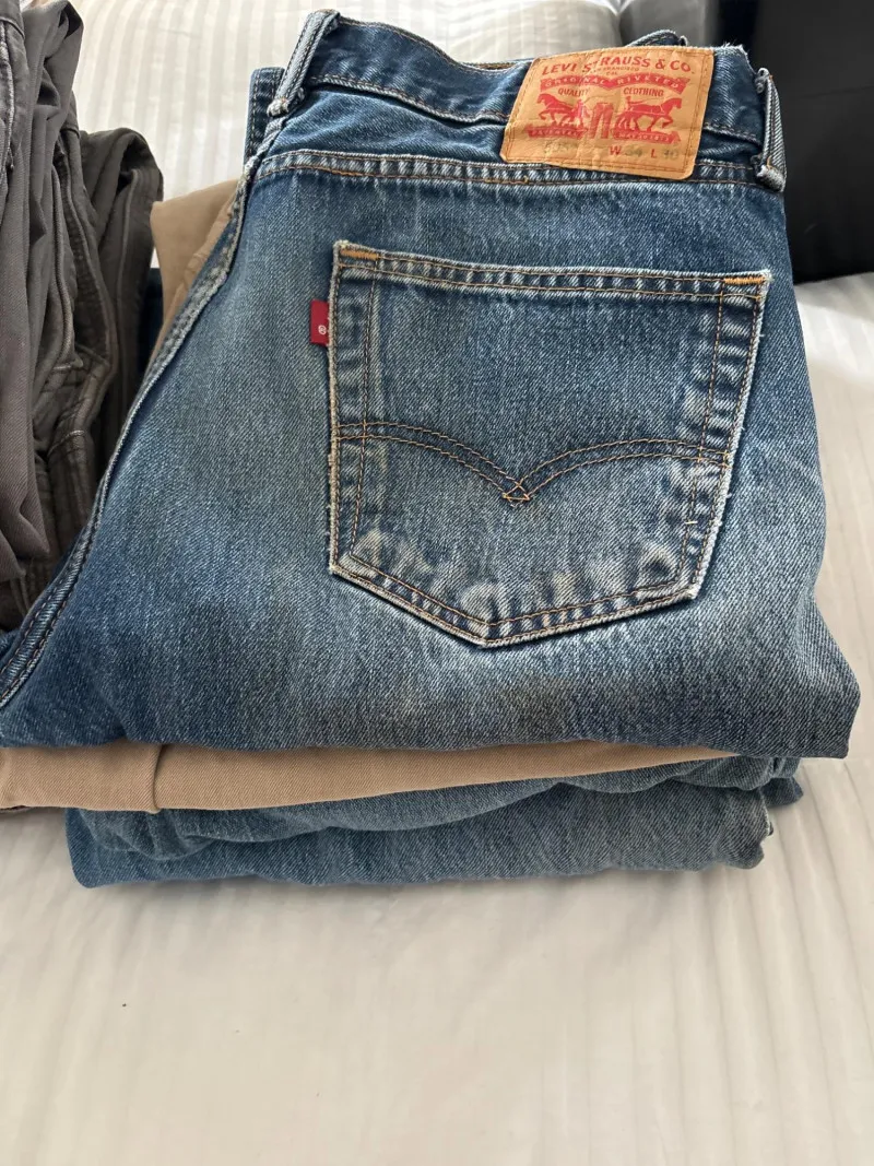 Men’s Jeans Lot – Levi’s, Carhartt & More Sizes 33–34 (9 Pair) - Sequim Estate Auction – A Life of Adventure & Humor | Ocean Bid Auction