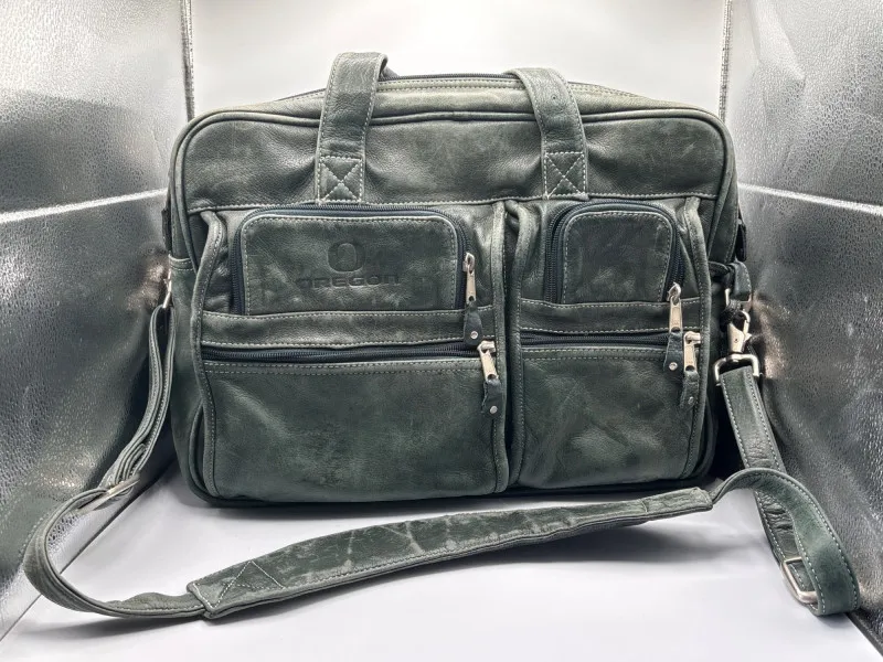 Vintage Distressed Leather Bag – Rugged Green Carry-All - Sequim Estate Auction – A Life of Adventure & Humor | Ocean Bid Auction