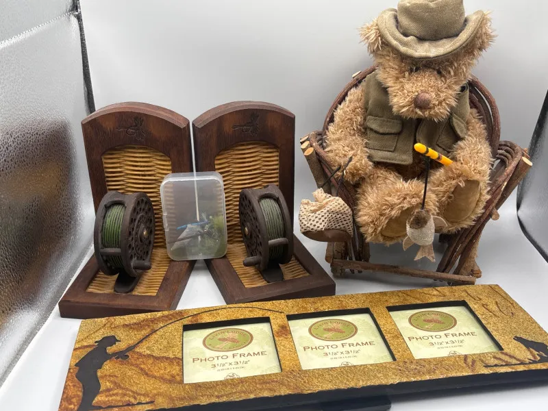Fly Fishing Reel Bookends Decor Lot Bear Frame Flies - Sequim Estate Auction – A Life of Adventure & Humor | Ocean Bid Auction