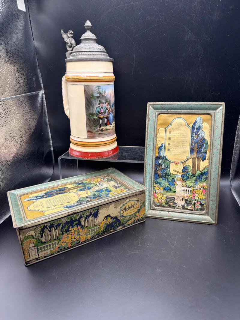 Vintage Artstyle Chocolate Tin & German Beer Stein - Designer Decor and Other Treasures | Ocean Bid Auction