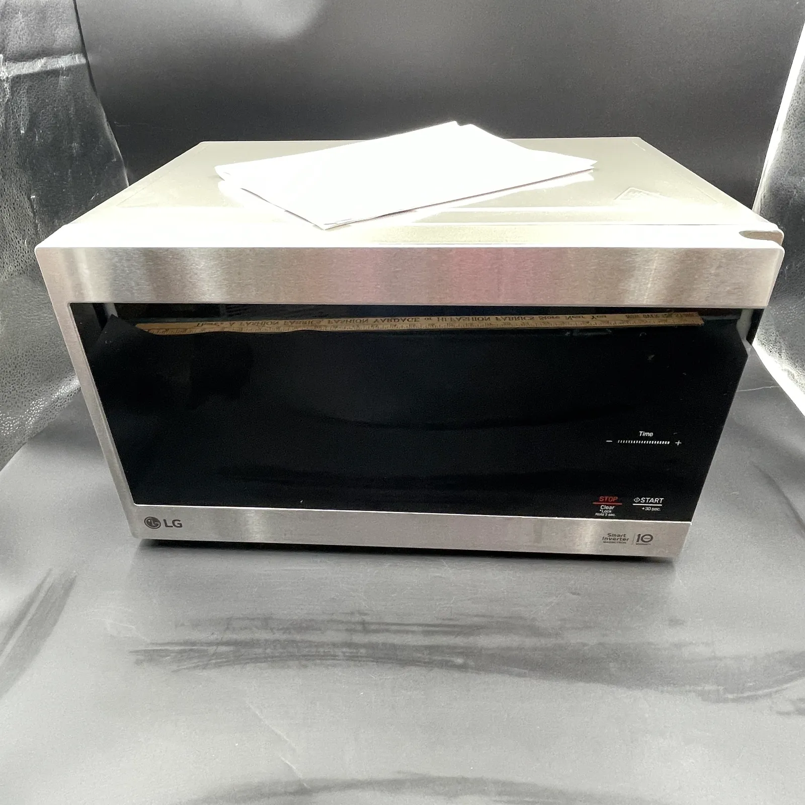 LG NeoChef 0.9 cu. ft. Stainless Steel Countertop Microwave Oven - Sterling Silver, Stones & Seattle History Estate Auction and 0% buyers premium! | Ocean Bid Auction