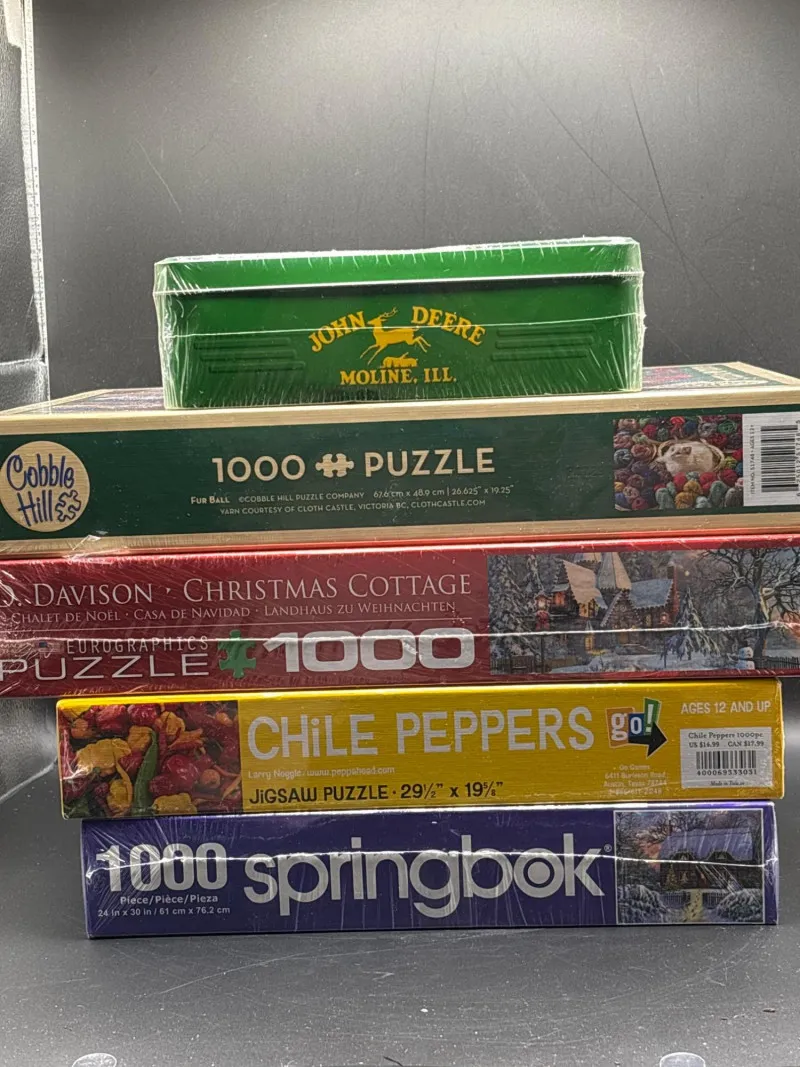 🧩 Puzzle Lot + John Deere Tin – 1000 Piece Sealed Sets - Collector’s Dream Auction – Lladro, Murano, Coastal Decor-Anacortes and Sequim pick-ups | Ocean Bid Auction