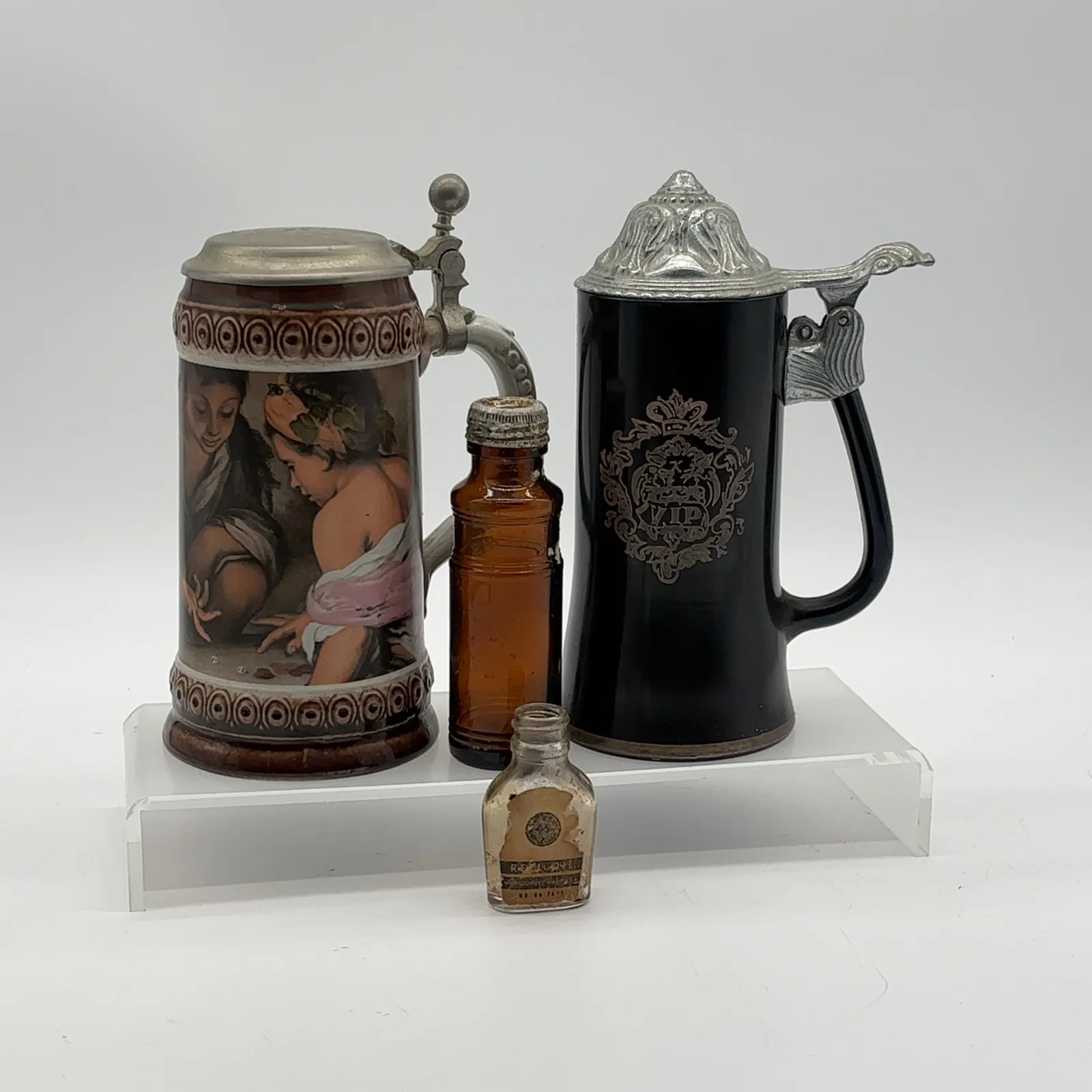 Decorative Lidded Beer Steins and Glass Bottles