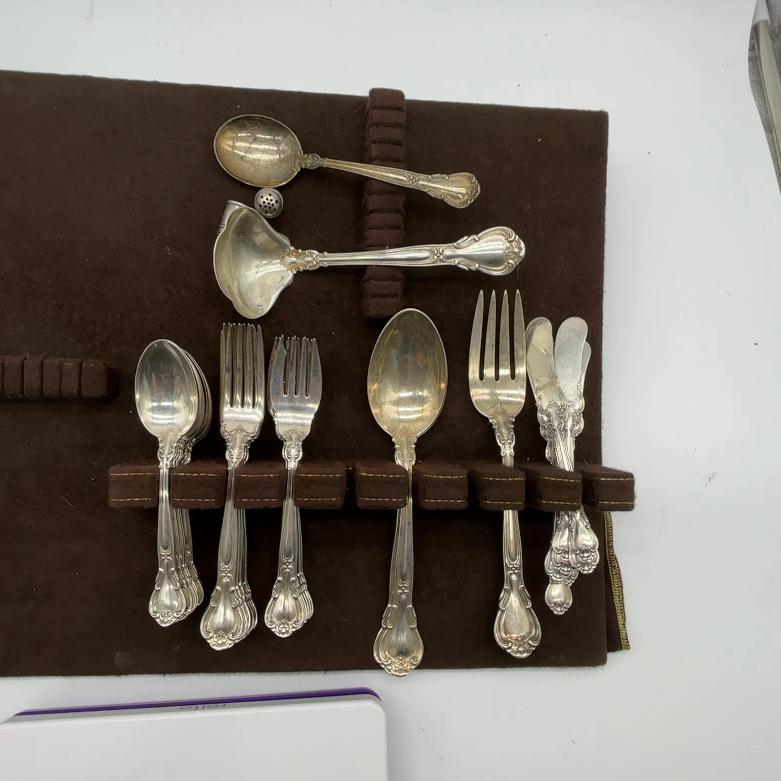 Assorted Ornate Pattern Flatware With Storage Roll