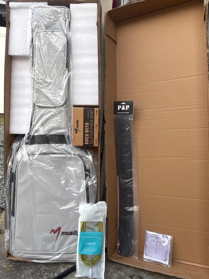 39" Electric Guitar Starter Kit Candy Apple Red New in Box Amp - Spring Treasure Auction – Vintage Finds & New-In-Box Surprises. | Ocean Bid Auction