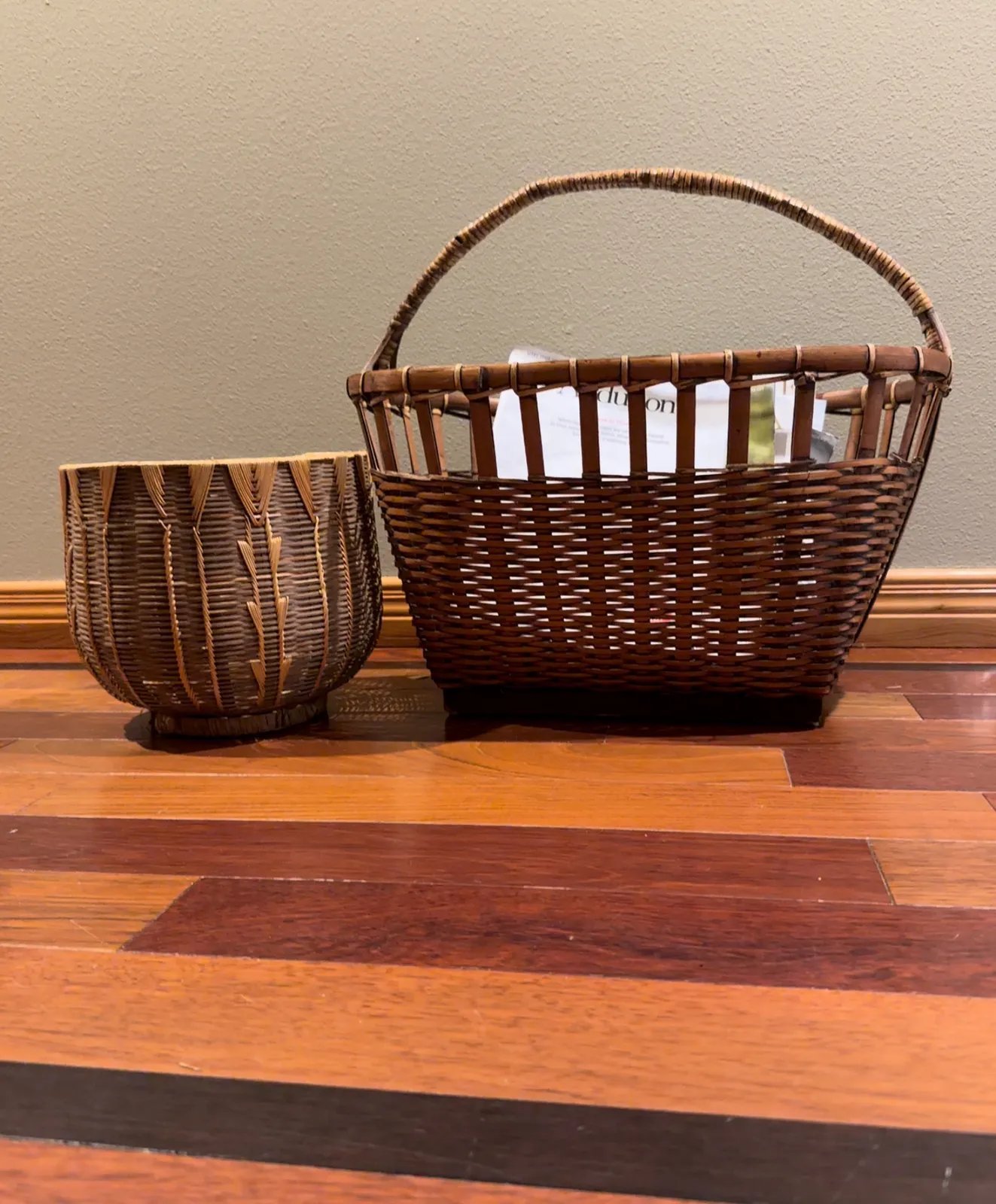 woven baskets set with magazines for home decor