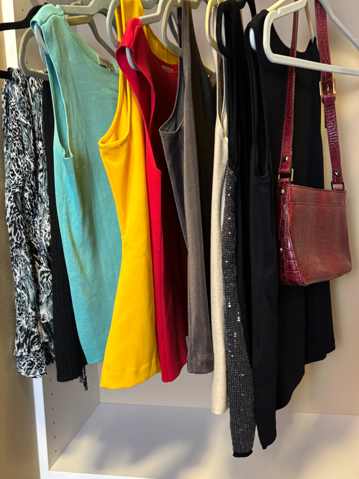 assorted tank tops skirt purse and hat