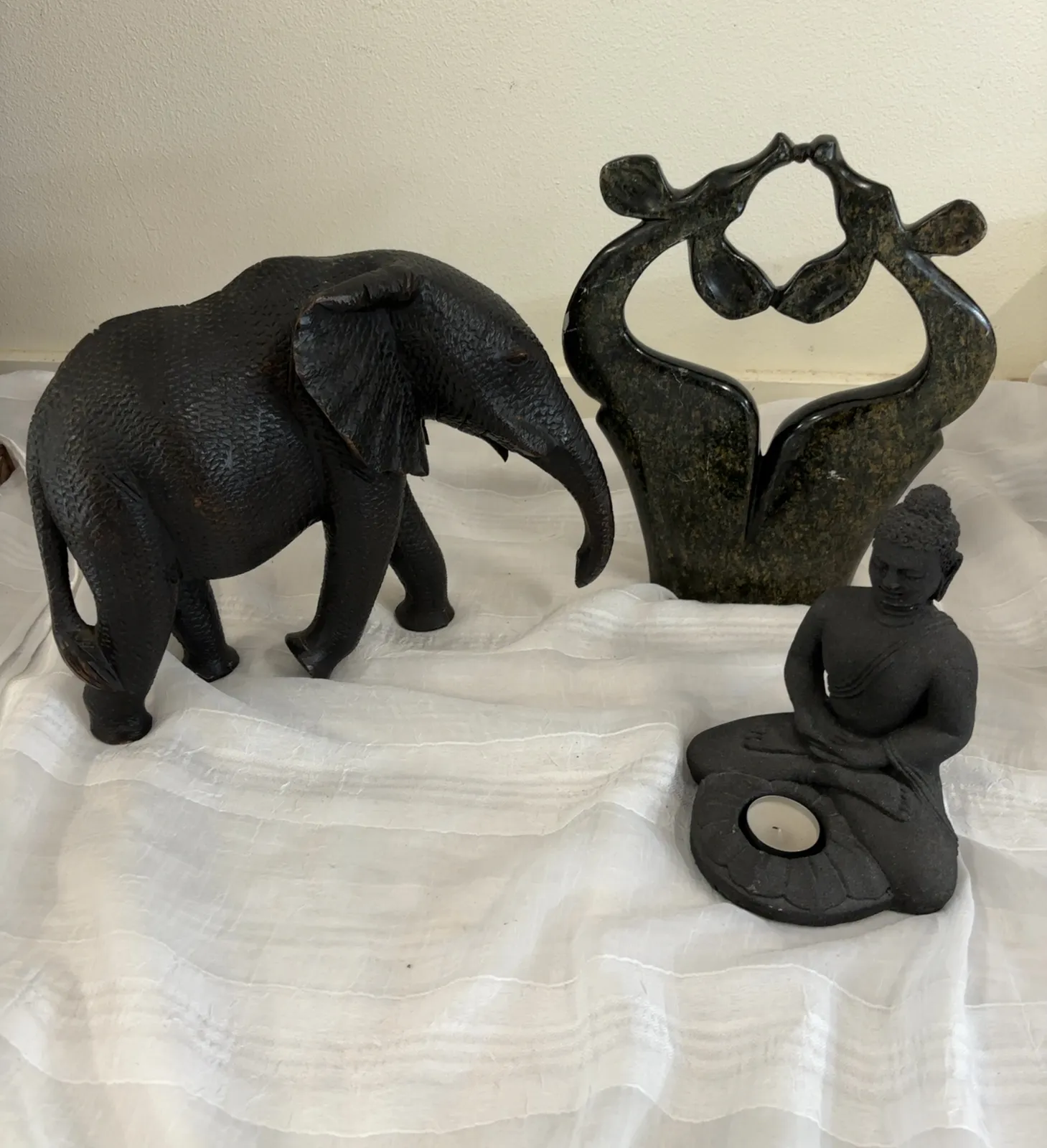 handcrafted elephant and buddha candle holder set